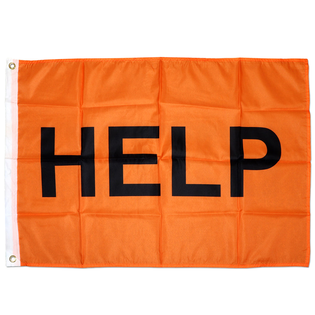 Neon orange signalling flag with HELP written on it for search and rescue operations when lost.