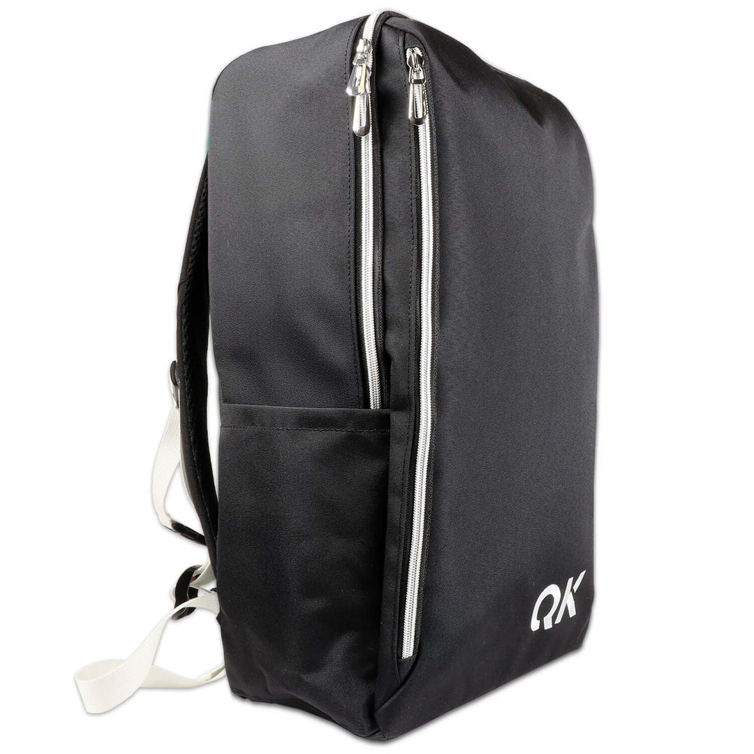 Black backpack with white zippers and 'QX' logo on a white background used for Urban Survival Kit