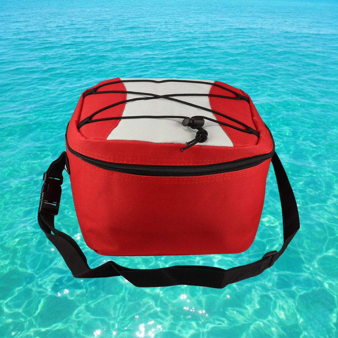 red waterproof cooler bag on water