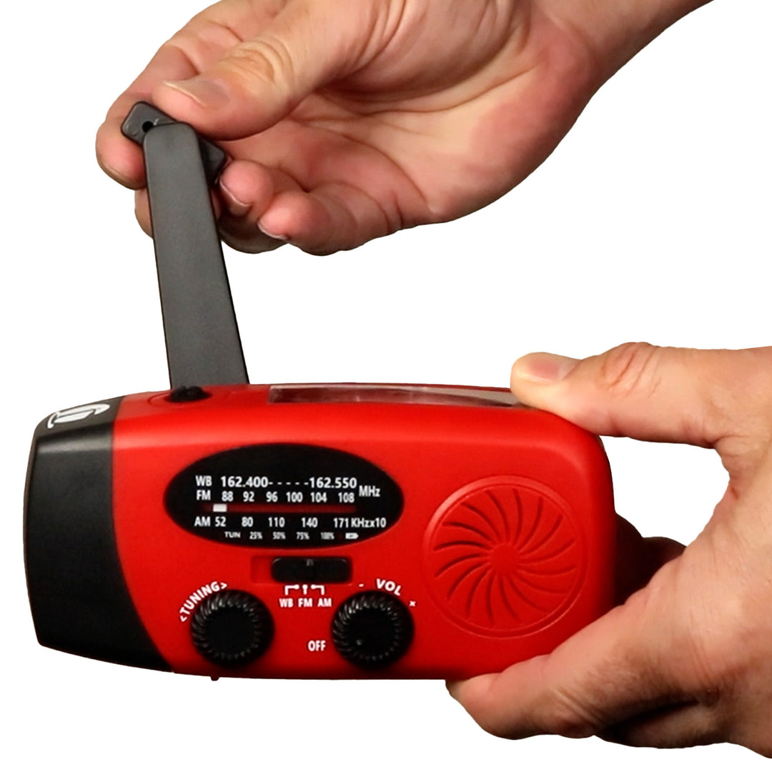Hand crank radio flashlight with solar and USB charging. Power generating power bank. 
