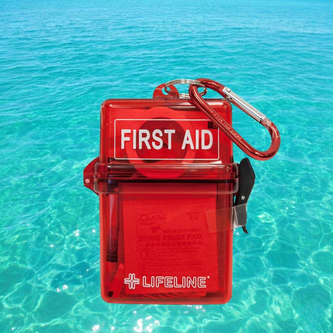 Red first aid kit with 'Lifeline' branding on a clear blue water background
