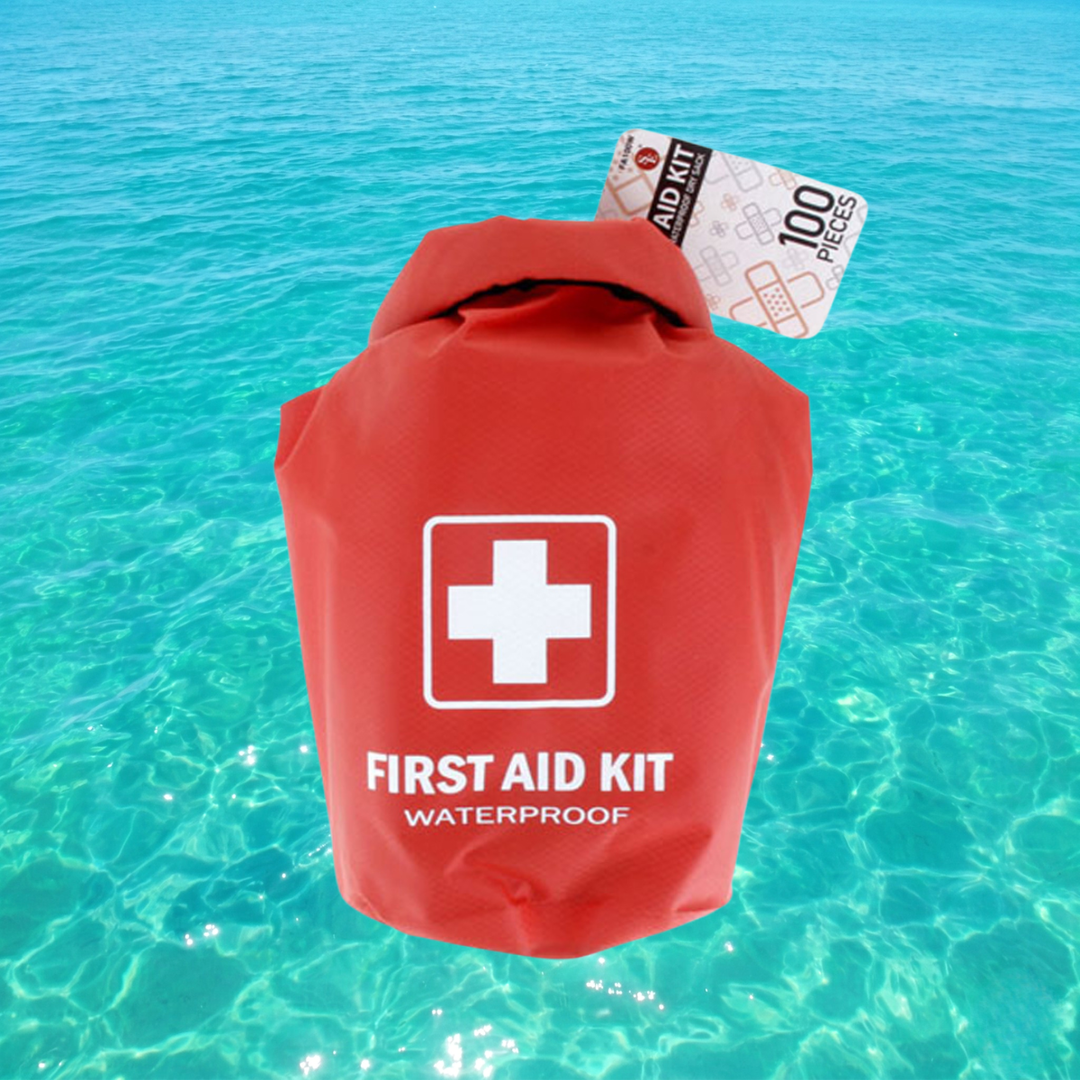 Red waterproof first aid kit with a white cross symbol on a blue water background