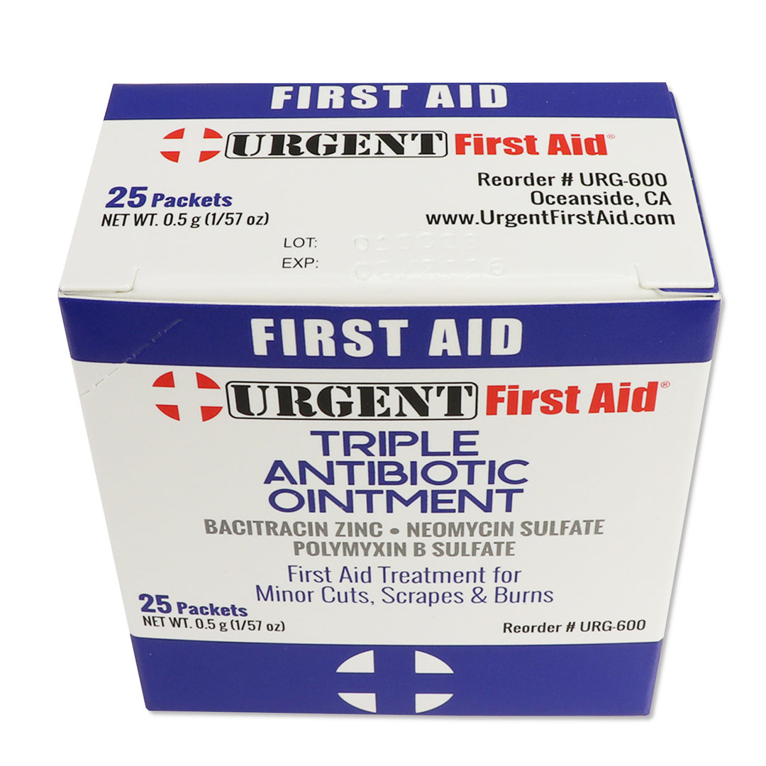 Box of Urgent First Aid triple antibiotic ointment on a white background. Antibacterial packets