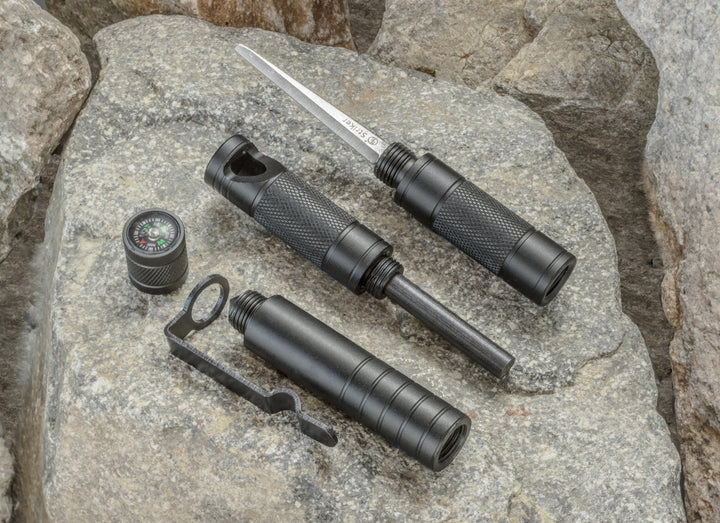 Multi function survival tool with whistle, compass, flint and striker. 