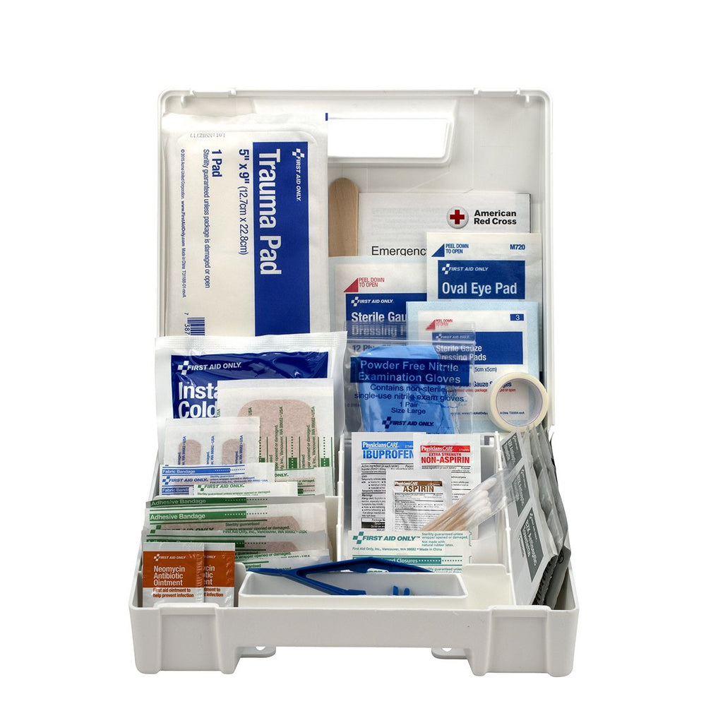 first aid kit open with medicine, bandages and supplies